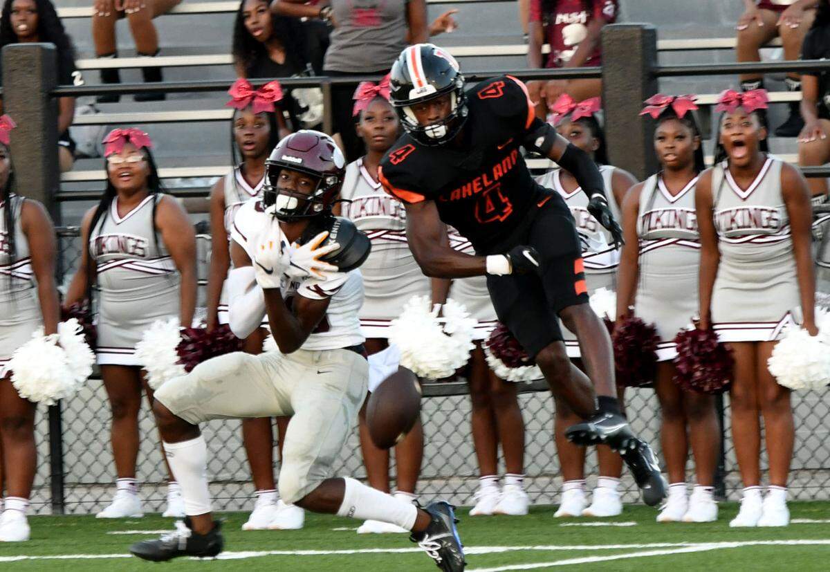 Norland wideout Terrence Honeywood has a reception broken up by Lakeland defensive back Derjah Hardy on Friday in Lakeland.