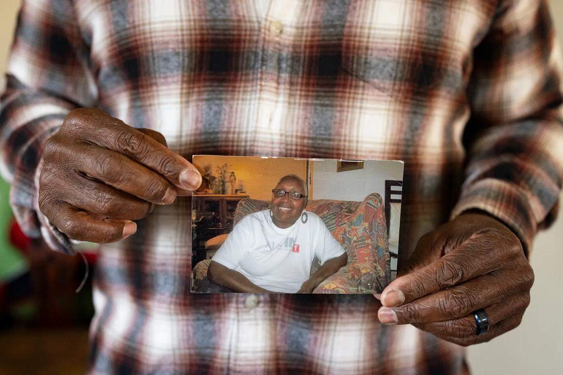 Leslie Adams holds a photo of his mother, Shirley, who died after developing infected bedsores at Lakeview Rehabilitation and Nursing Center, according to a lawsuit he filed. A court awarded the family $17 million.