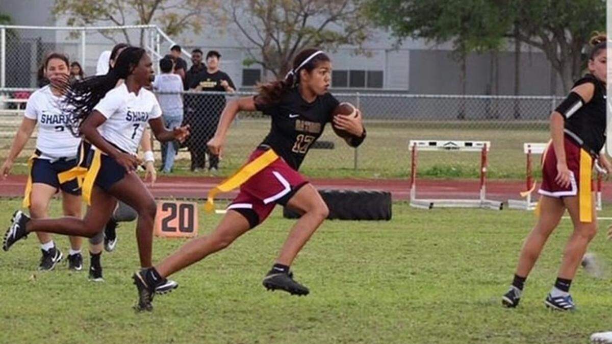 Goleman's Tiffany Walker, pictured running with the ball, committed to St. Thomas University’s first women’s flag football team. 