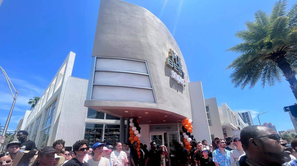 Fans await DJ Khaled’s arrival at the grand opening of the We The Best SNIPES store on Thursday, August 3, 2023 in Miami Beach, Florida. Complete with a recording studio, homages to Art Deco and even an Aston Martin-inspired watersports vehicle, the store aims to provide an “unique shopping experience like no other,” DJ Khaled said in a statement.