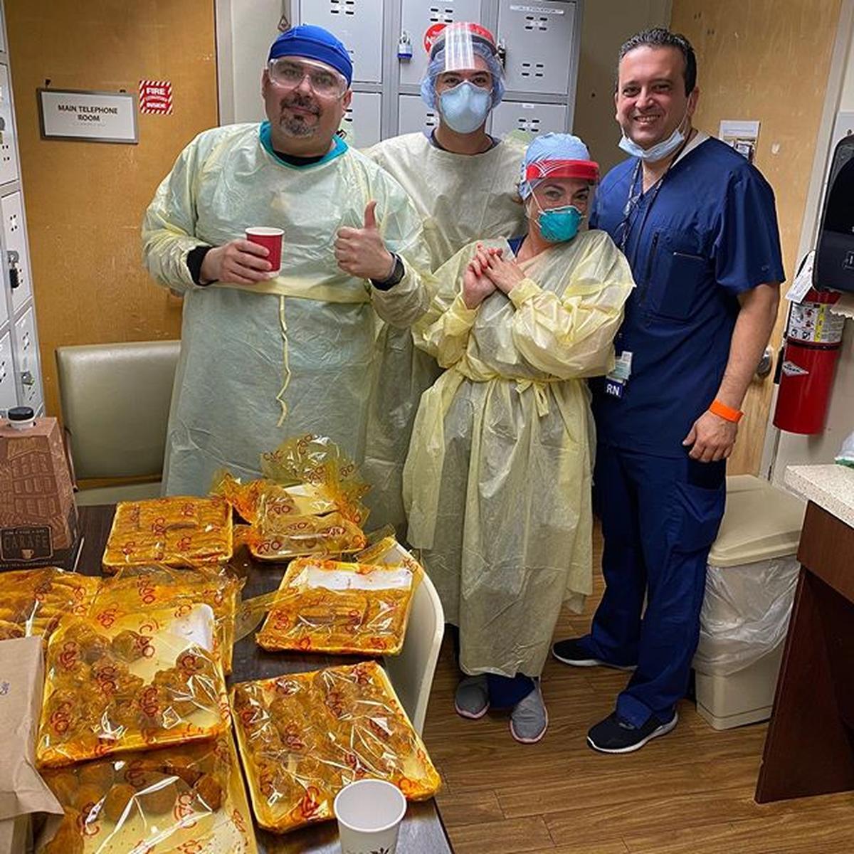 Cao Bakery Cafe, a restaurant participating in the Greater Miami Convention & Visitors Bureau’s Miami Salutes program, delivers a food donation from Floridian First Realty to the ER Department at Coral Gables Hospital.