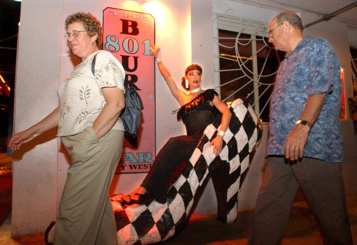 Sushi beckons tourists to come in and see the show performed at the 801 Bar on Duval Street in Key West in 2002.