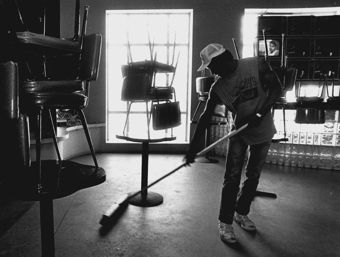 In this file photo from May 2, 1989, Woody’s on the Beach gets its final sweeping. The once popular music venue at 455 Ocean Dr. in Miami Beach, co-owned by Ron Wood of the Rolling Stones, closed for good that month after neighbors complained the rock club, which opened in December 1987, was just too noisy.