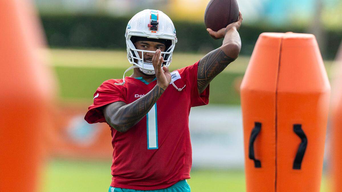 Miami Dolphins quarterback Tua Tagovailoa (1) throws the ball during training camp at Baptist Health Training Complex on Friday, July 26, 2024, in Miami Gardens, Fla.