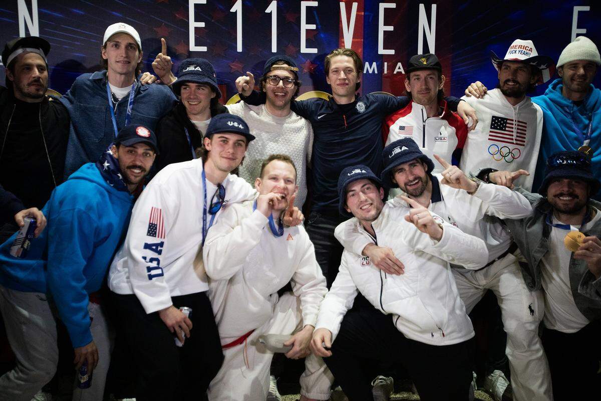 Members of the United States men’s hockey team pose for a group photo at E11EVEN Miami during their gold-medal celebration on Monday, Feb. 23, 2026, in Miami, after returning from Italy following their victory over Canada at the 2026 Winter Olympics.