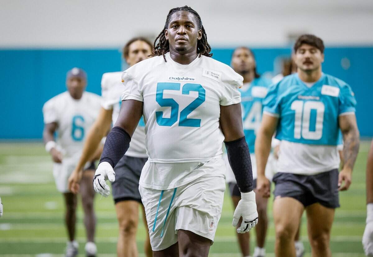 Miami Dolphins offensive tackle Patrick Paul (52) arrives for practice drills at the Miami Dolphins Training Camp in Miami Gardens, Florida, on Friday, July 31, 2026.