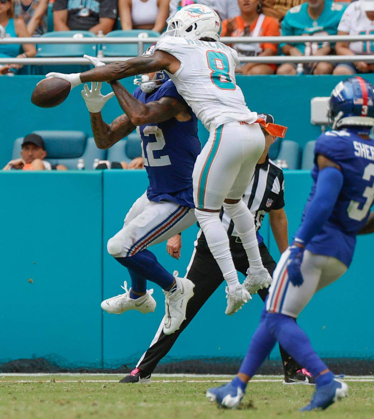 Miami Dolphins safety Jevon Holland (8) blocks a pass to New York Giants tight end Darren Waller (12) in the second half at Hard Rock Stadium in Miami Gardens on Sunday, October 8, 2023.