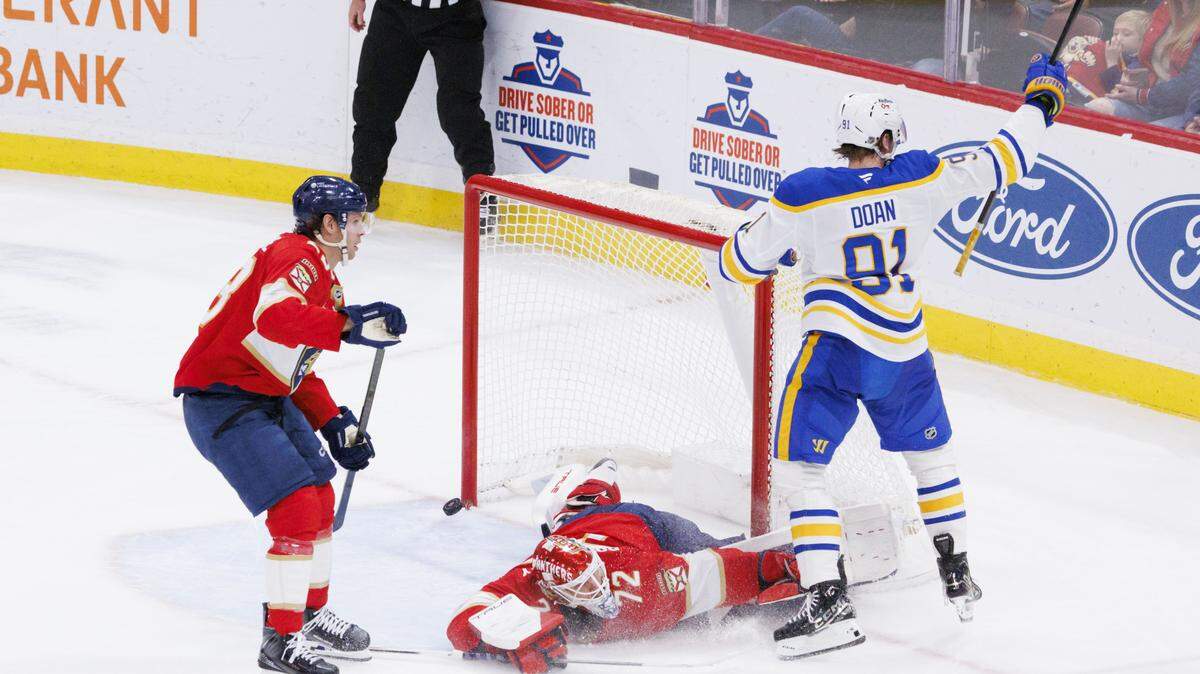 Buffalo Sabres right wing Josh Doan (91) scores a goal on Florida Panthers goaltender Sergei Bobrovsky (72) during the third period of a game on Monday, Feb. 2, 2026, at Amerant Bank Arena in Sunrise, Fla. The Buffalo Sabres beat the Florida Panthers 5-3.