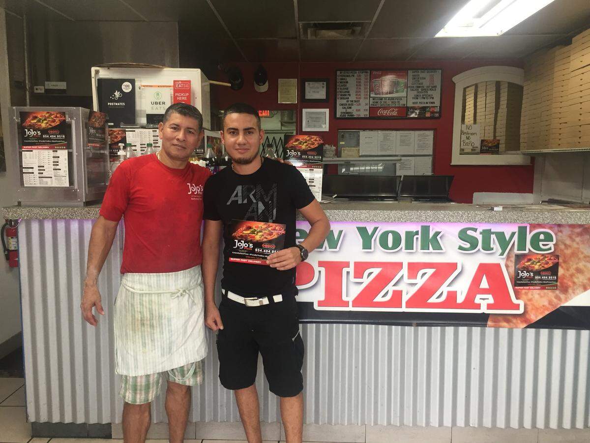 Owners Francisco Laniez, left, and Jonathan Naranjo have been running JoJo's for the past three years. Neither was pleased when they discovered Domino's was moving next door.