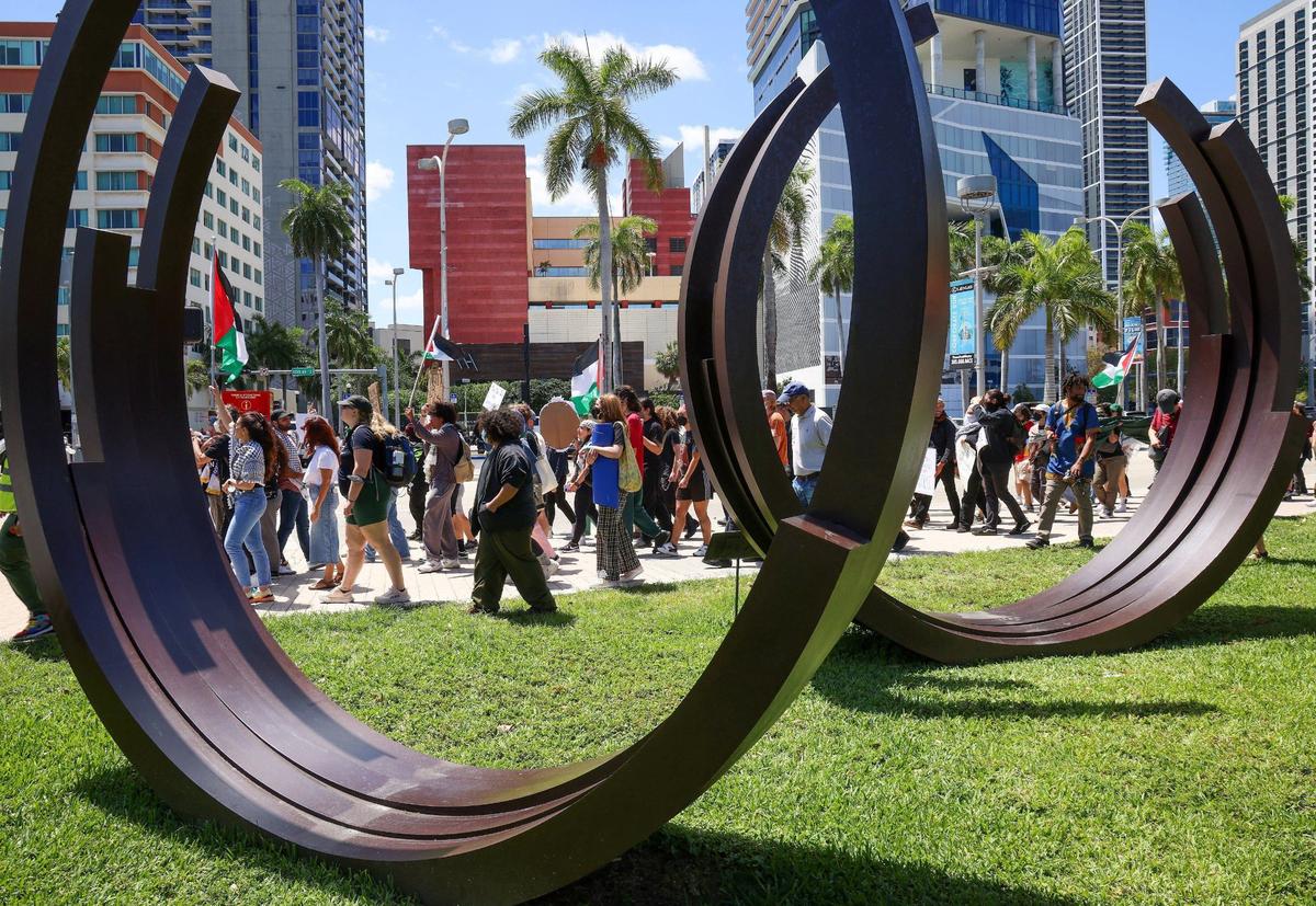 A group protesting for ceasefire in support of Gaza marched towards Bayside, passing in front of the Bernar Venet’s ‘Arcs in Disorder: 3 Arcs x 5’ on Monday, April 15, 2024. Seven protesters were arrested on charges of blocking the intersection of 3rd Street and northbound Biscayne..