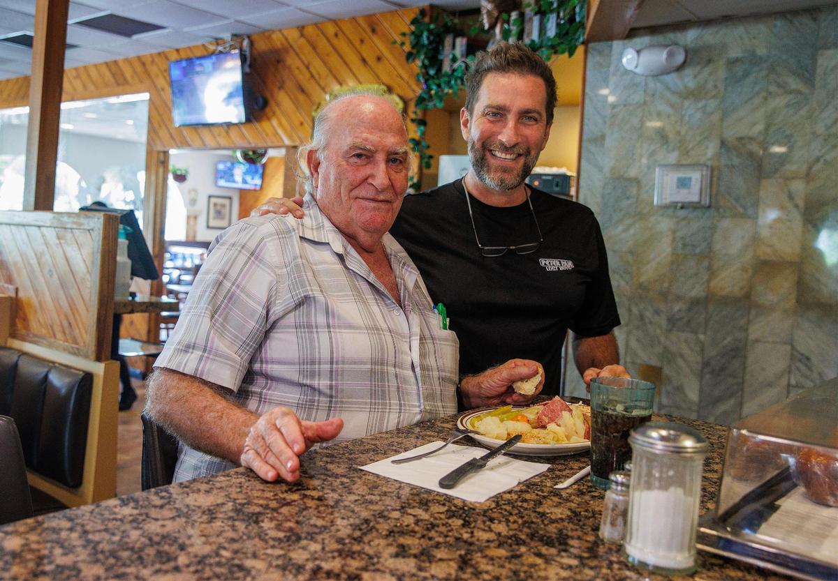 Jeronimos and his father Panagiotis “Peter” Kourkoumelis, owners of the Peter Pan Diner, which opened in 1979.
