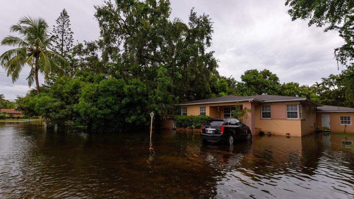 Climate change can amplify big rainstorms, but true fixes are far off for South Florida