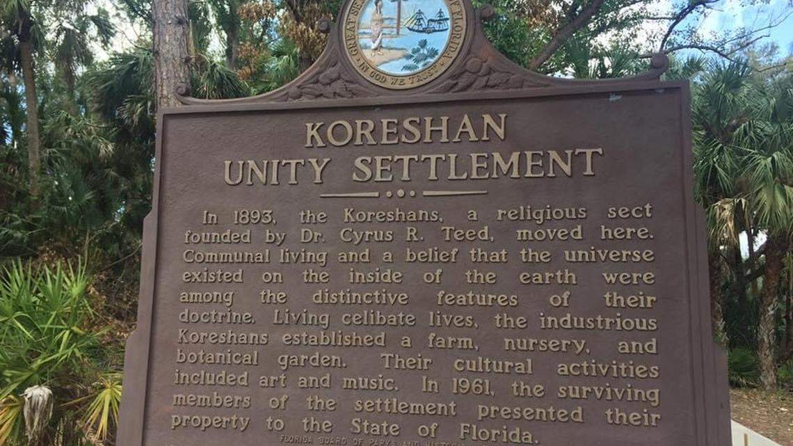A photo of a site marker at Koreshan State Park describing the group’s legacy.