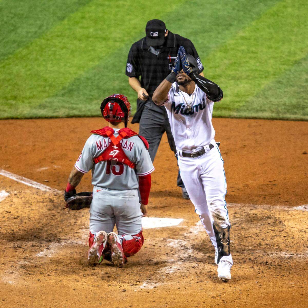 Miami Marlins outfielder Starling Marte (6) reacts after hitting a home run in the seventh inning of a Major League Baseball game against the Philadelphia Phillies at Marlins Park in Miami, Florida on Monday, September 14, 2020.
