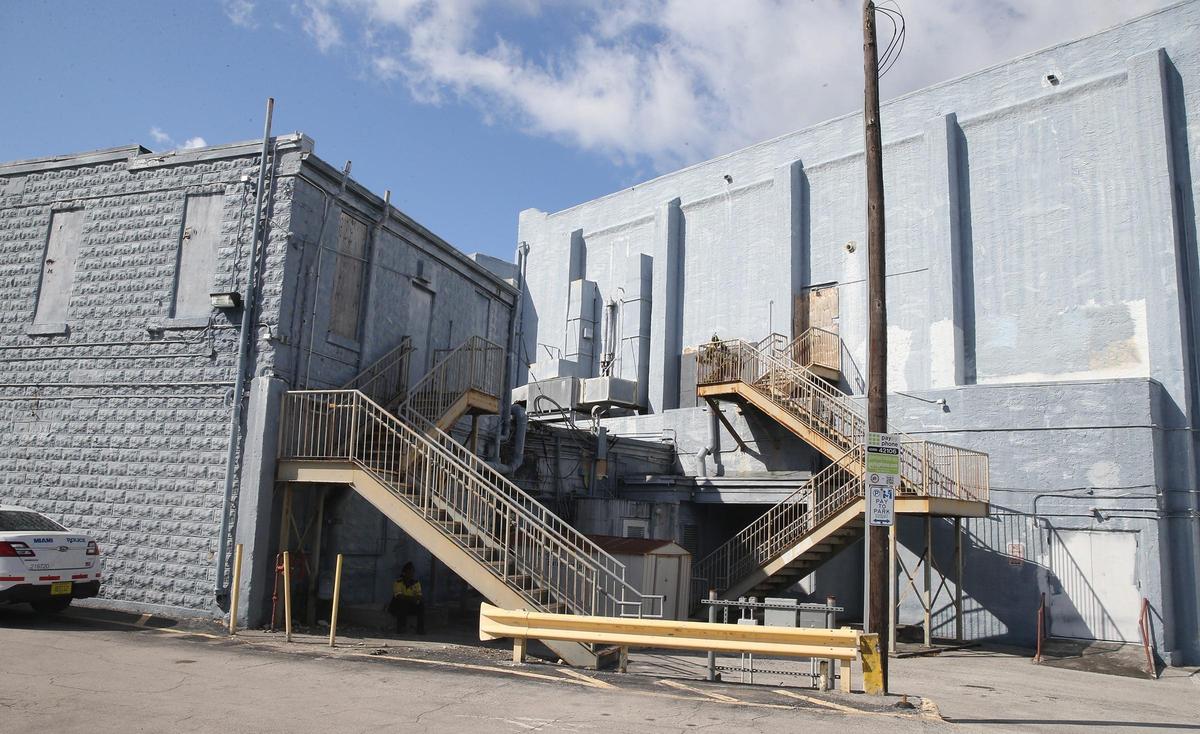 A dispute over the fate of the Coconut Grove Playhouse boils down on whether to save the exterior of the auditorium at the rear of the theater, seen here on May 17, as historic. A court has ruled the city can’t require Miami-Dade County, which wants to demolish the rear under a plan to rebuild the playhouse, to save the interior.