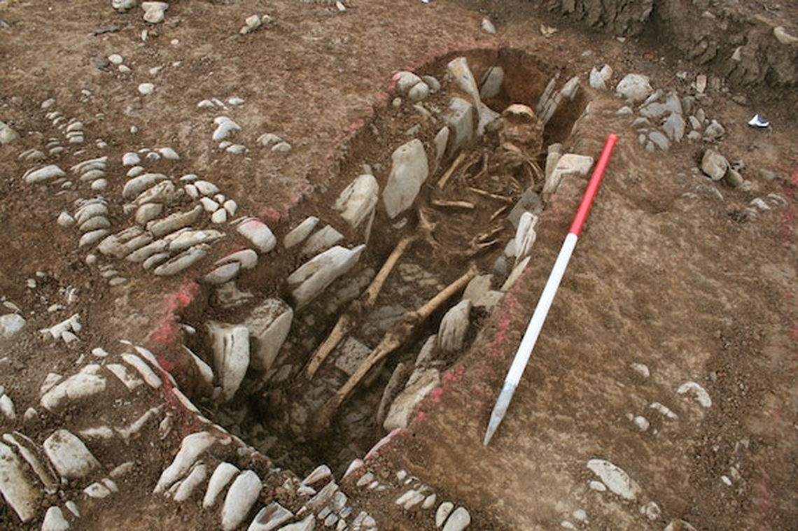 A stone-lined grave discovered at the ancient cemetery.