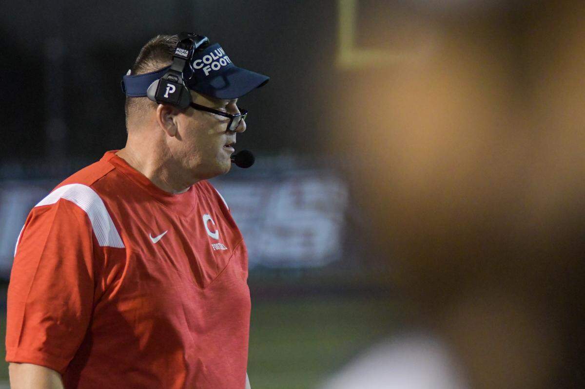 Miami Columbus coach Dave Dunn watches on during his team’s game against Doral Academy on Friday, Oct. 14, 2022, at Doral Academy.