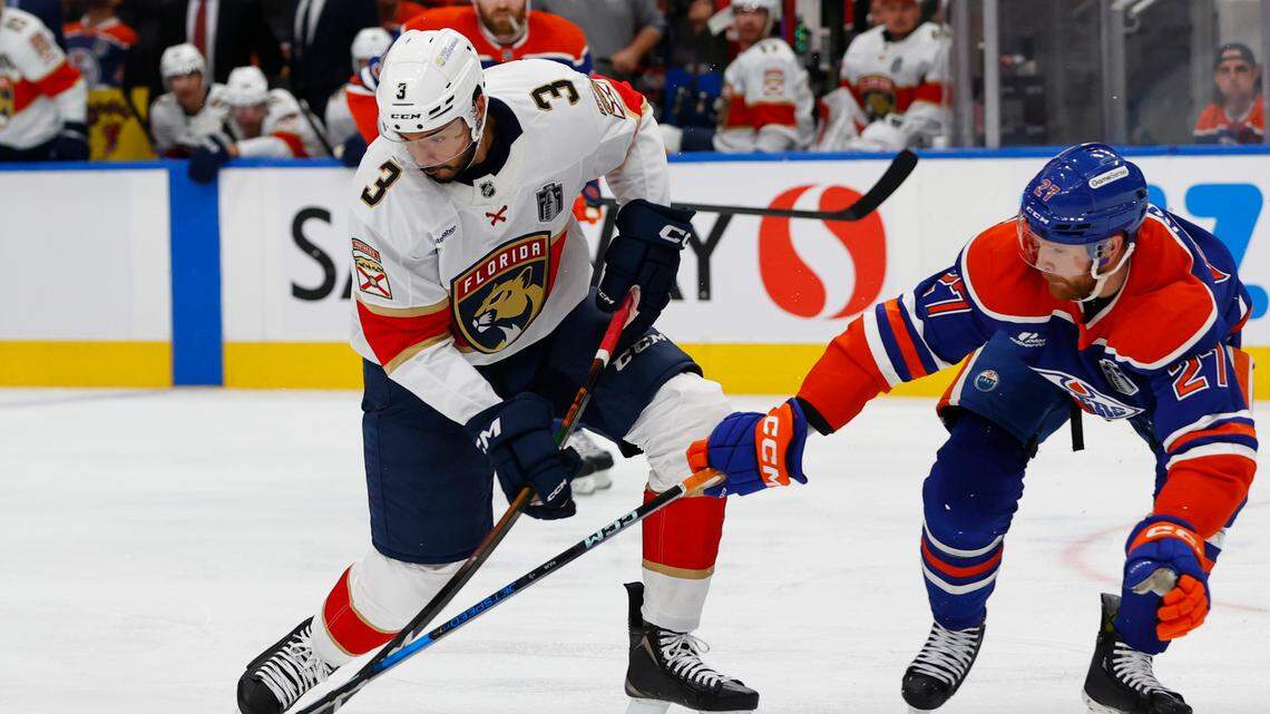 Jun 4, 2025; Edmonton, Alberta, CAN; Florida Panthers defenseman Seth Jones (3) skates with the puck against Edmonton Oilers defenseman Brett Kulak (27) in the second period in game one of the 2025 Stanley Cup Final at Rogers Place. Mandatory Credit: Perry Nelson-Imagn Images