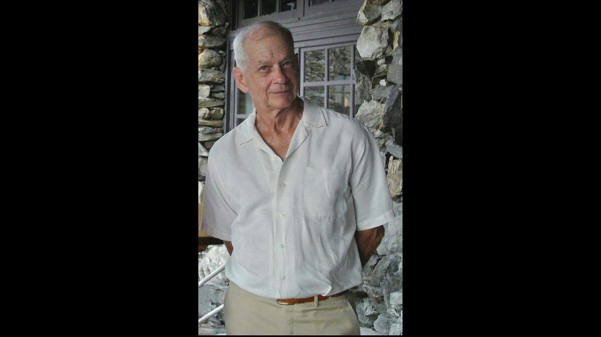 Michael Baxter, who served as Miami Herald deputy managing editor.
