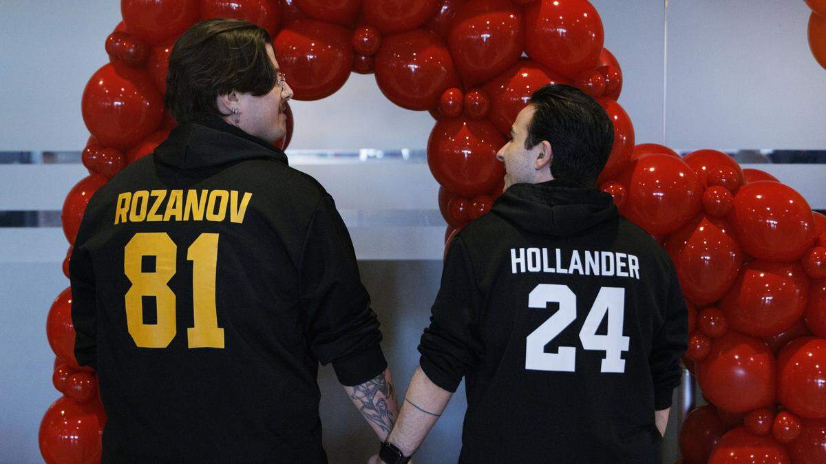Austin Lee, left, and Nate Cooper pose for a photo in Heated Rivalry themed sweatshirts during Florida Panthers Pride Night on Tuesday, March 31, 2026, at Amerant Bank Arena in Sunrise, Fla.