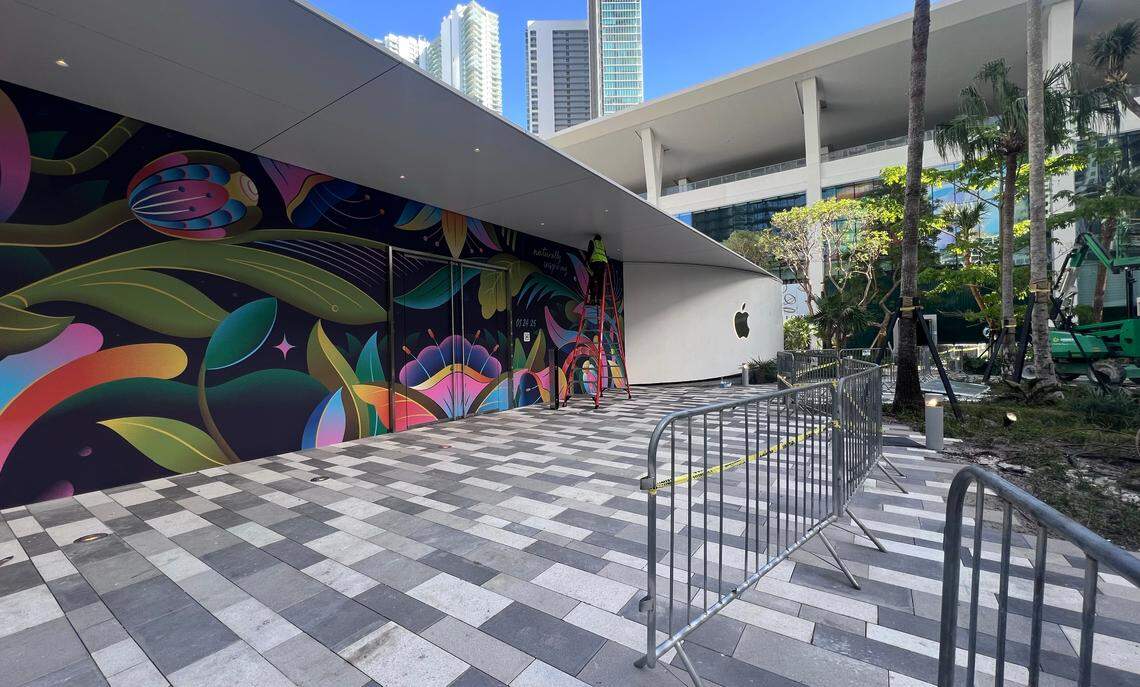 Downtown Miami’s coming Apple store, the neighborhood’s first, will open in January 2025. The barricade with the Apple logo and its garden theme, was revealed on Jan. 10, 2025.