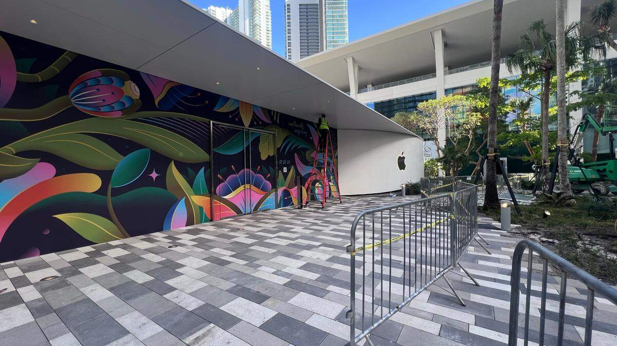 Downtown Miami’s coming Apple store, the neighborhood’s first, will open in January 2025. The barricade with the Apple logo and its garden theme, was revealed on Jan. 10, 2025.