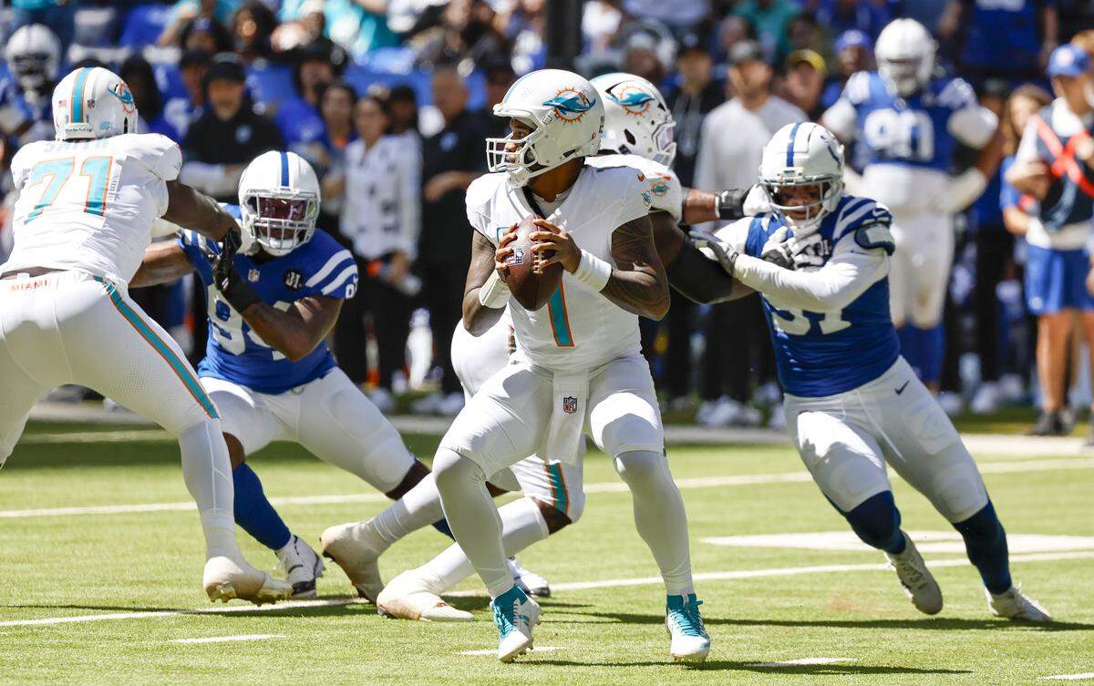 Miami Dolphins quarterback Tua Tagovailoa (1) prepares to throw during the first half of an NFL game against the Indianapolis Colts during the first half of an NFL game against Indianapolis Colts at Lucas Oil Stadium on Sunday, September 7, 2025, in Indianapolis, Indiana.
