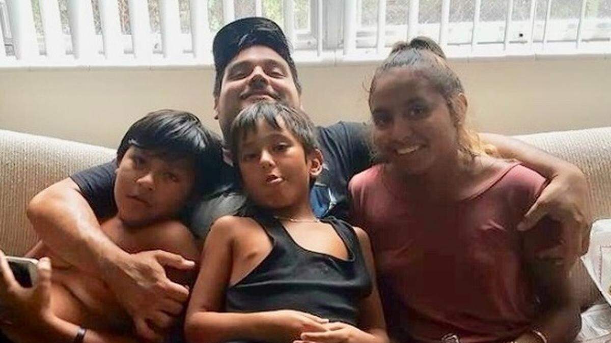 Oswald Zambrano, center, with his children in a family photo posted to a GoFundMe page his family set up after he was stabbed on July 16, 2018. He died from his wounds on July 26, 2018.