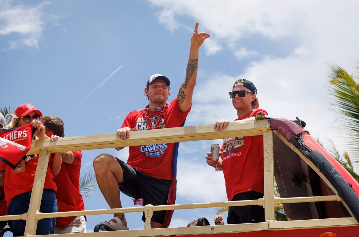 Florida Panthers defenseman Dmitry Kulikov (7) waves to fans during the Florida Panthers Stanley Cup Championship victory parade on Sunday, June 22, 2025 down Las Olas in Fort Lauderdale, Fla.