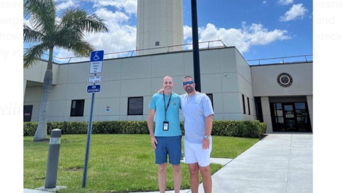 Controller Robert Morgan, left, with the passenger he helped land a single-engine Cessna safely after an unusual in-flight emergency.
