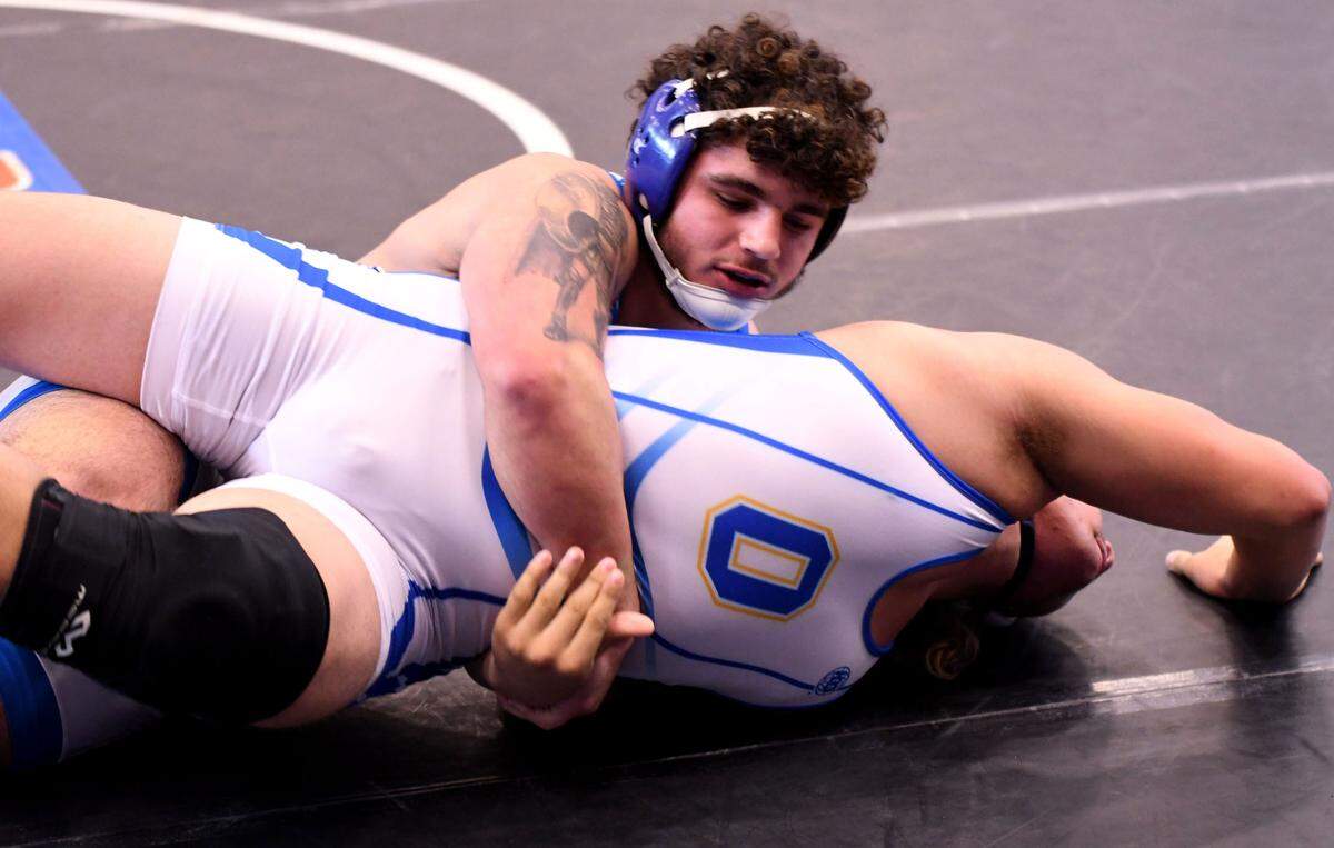 South Dade’s Sawyer Bartlet defeats Osceola’s Jomar Sanchez during a 285-pound match in the 3A finals duel at the FHSAA Duals Wrestling State Championships on Saturday at Osceola High School in Kissimmee.