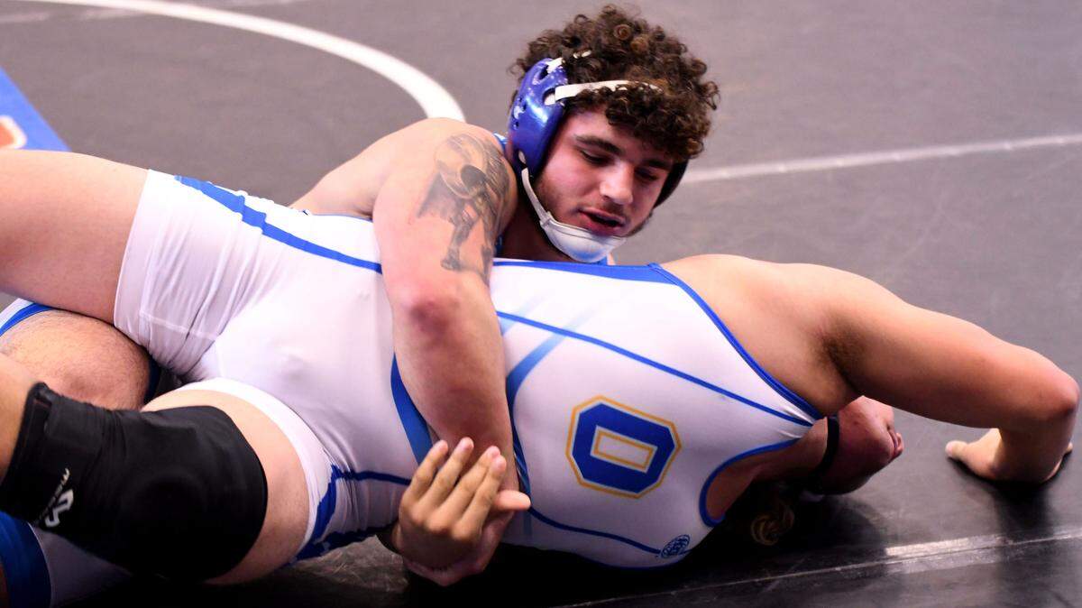 South Dade’s Sawyer Bartlet defeats Osceola’s Jomar Sanchez during a 285-pound match in the 3A finals duel at the FHSAA Duals Wrestling State Championships on Saturday at Osceola High School in Kissimmee.