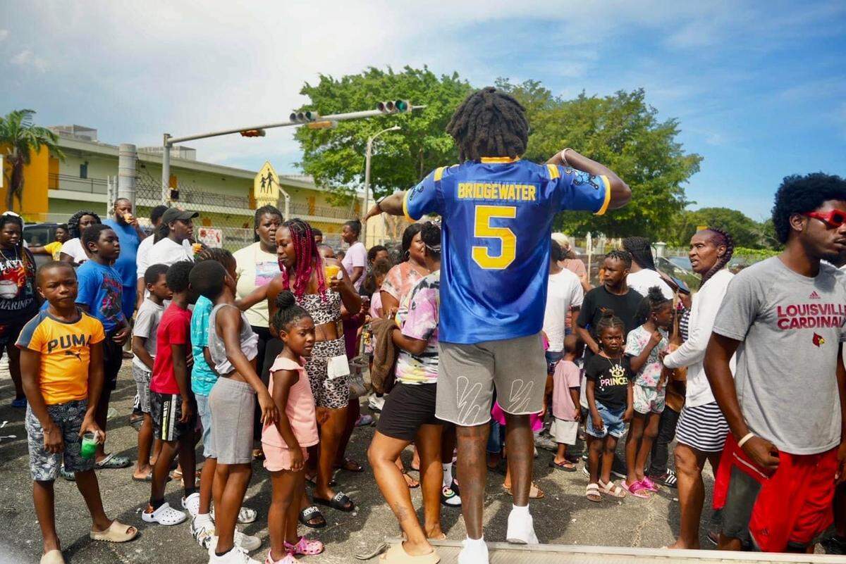 Former NFL quarterback and championship-winning Miami Northwestern coach Teddy Bridgewater poses with his customized jersey that was created by All Stars Miami. Bridgewater’s jersey was one of the first that Anthony Castro, All Stars Miami’s founder and CEO, created.