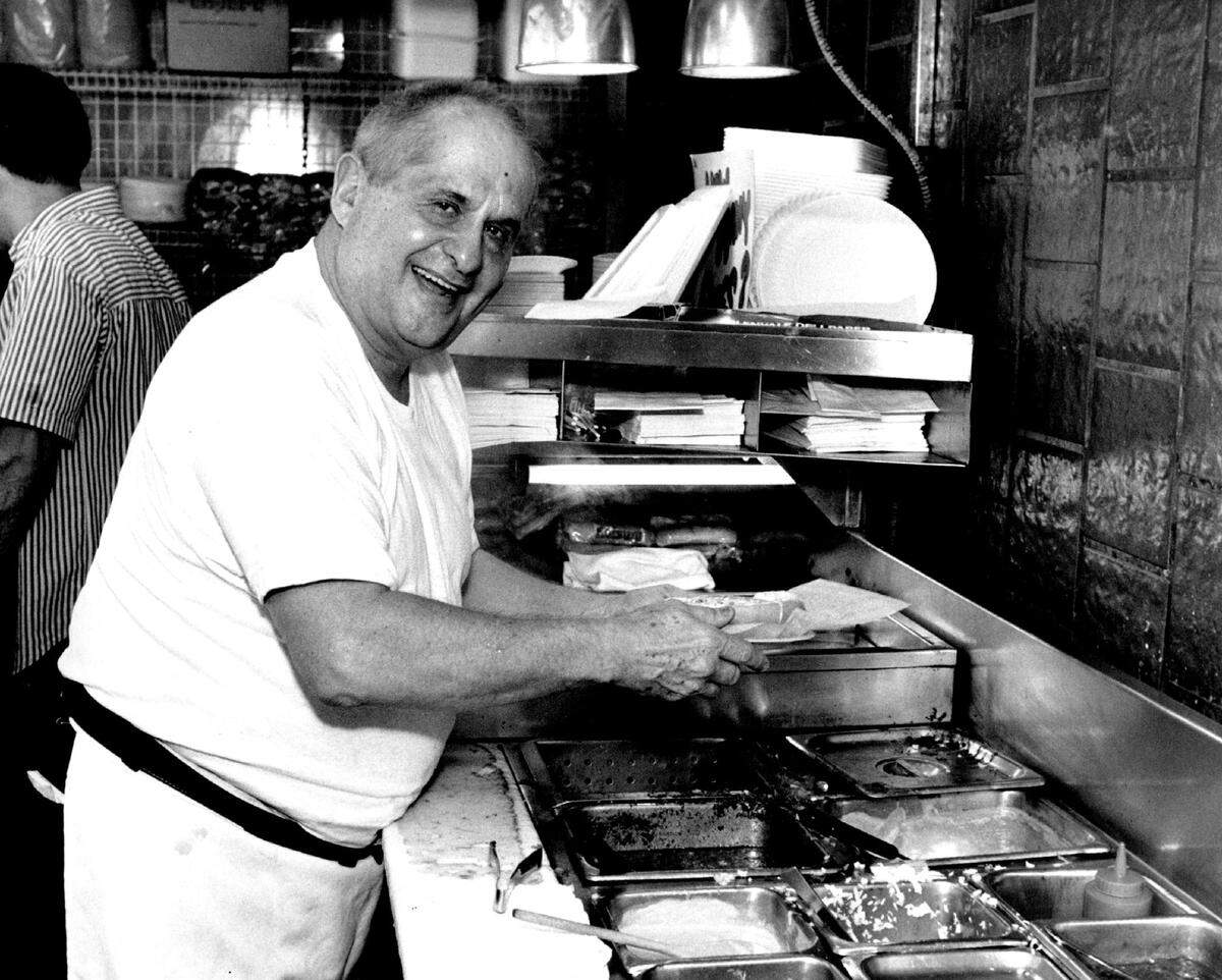 Bob Arbetter in his hot-dog restaurant in 1990.