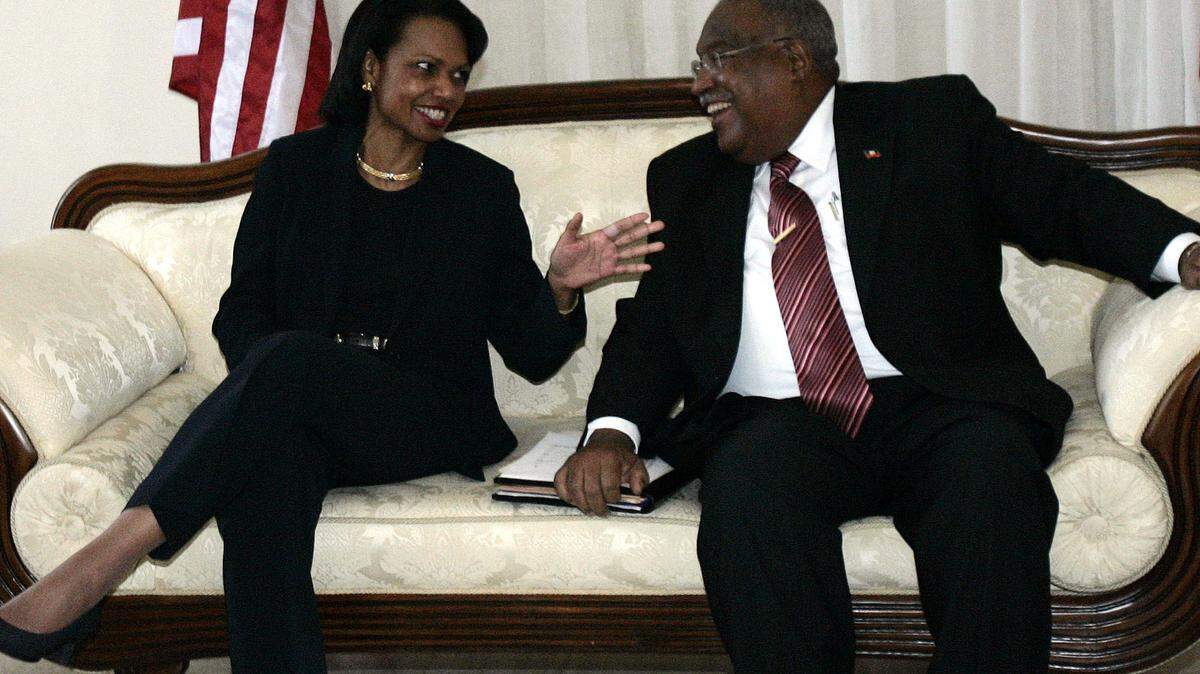 In this file photo, Secretary of State Condoleezza Rice, left, and then-Interim Haiti Prime Minister Gérard Latortue meet at the Presidential Palace in Port-au-Prince, Haiti.