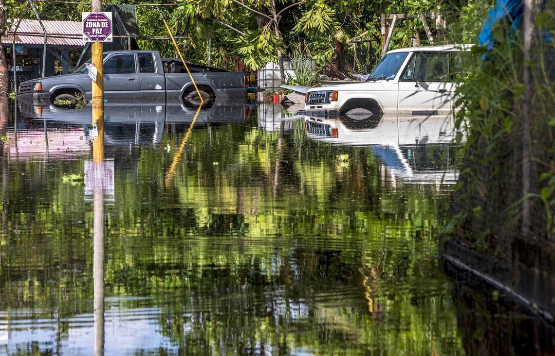 View of submerged cars at “La Rivera Street” flooded by Hurricane Fiona’s heavy rain that flooded the Miñi Miñi neighborhood in the town of Loíza on the northeastern coast of Puerto Rico as the hurricane passed by the island on Monday September 18, on Wednesday, September 21, 2022.