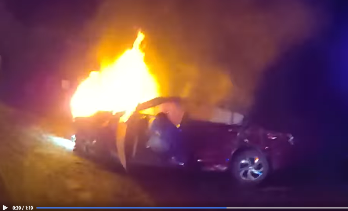 The driver was begging for help getting out of the burning car when deputies arrived at the crash scene near Vero Beach, video shows.