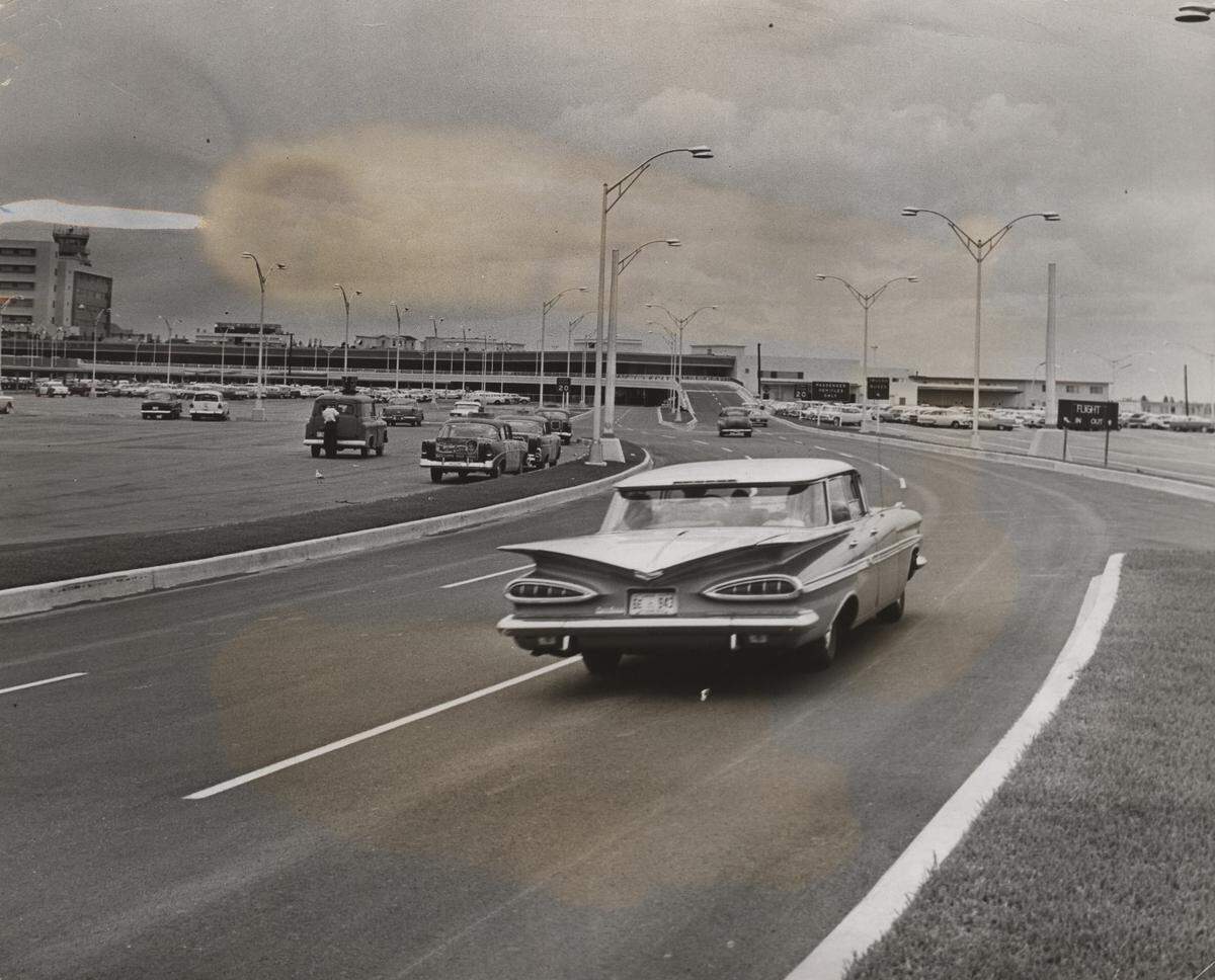 A sign at right, leading from overpass approach to LeJeune Road in 1959.