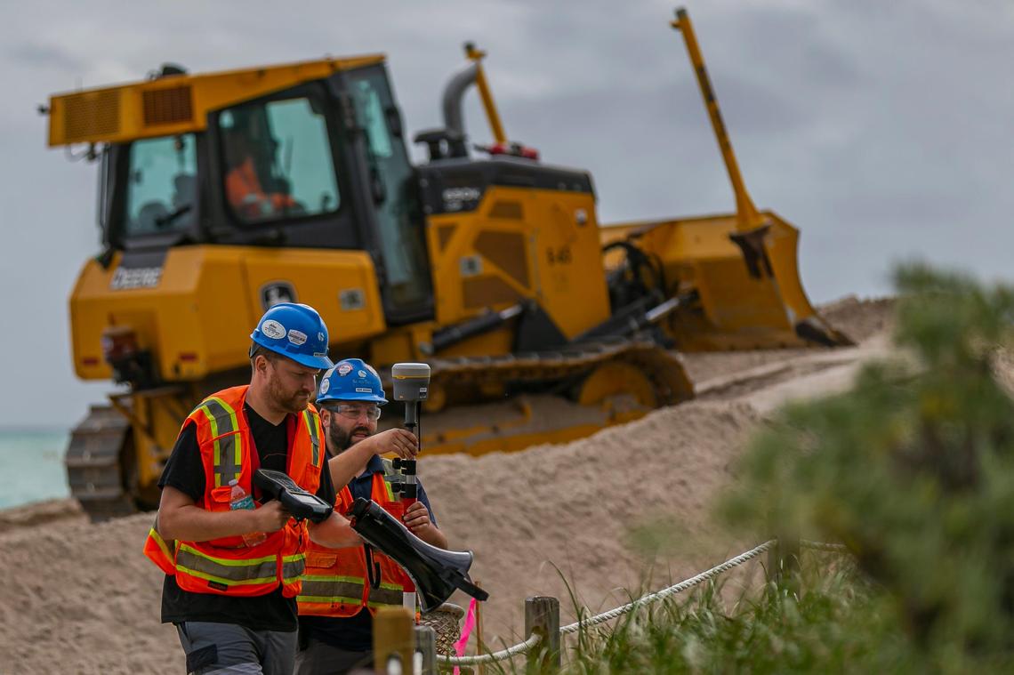 The U.S. Army Corps of Engineers dumps new sand from Central Florida along the Miami Beach shoreline near 65th Collins Avenue on Monday, January 13, 2019. The $16 million dollar project is funded by the federal government. It aims to fight back against erosion and protect properties from storm surges.