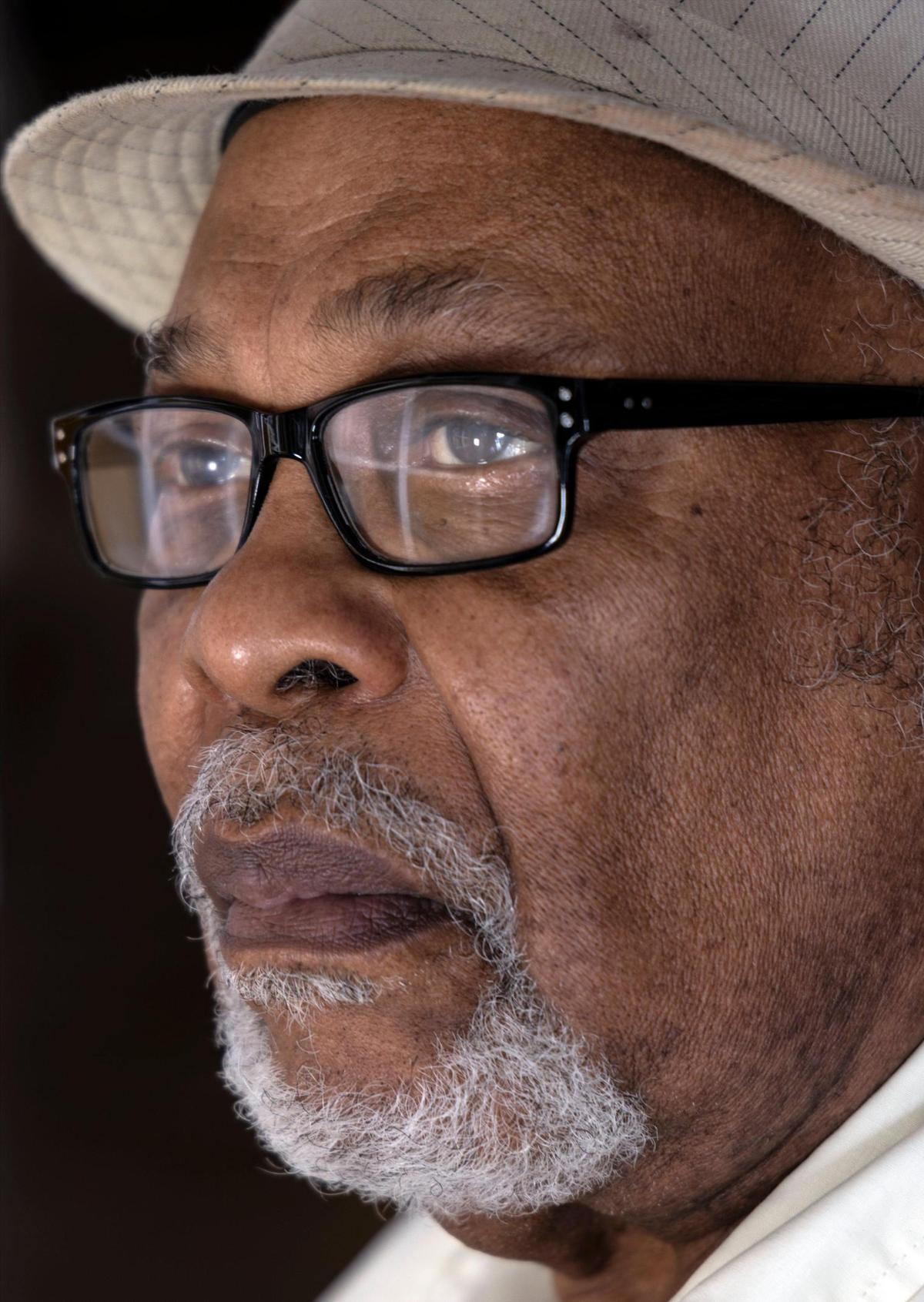 Jean-Marie ‘Jan Mapou’ Denis, owner of Libreri Mapou, is photographed inside his Little Haiti bookstore on Saturday, Aug. 14, 2021.