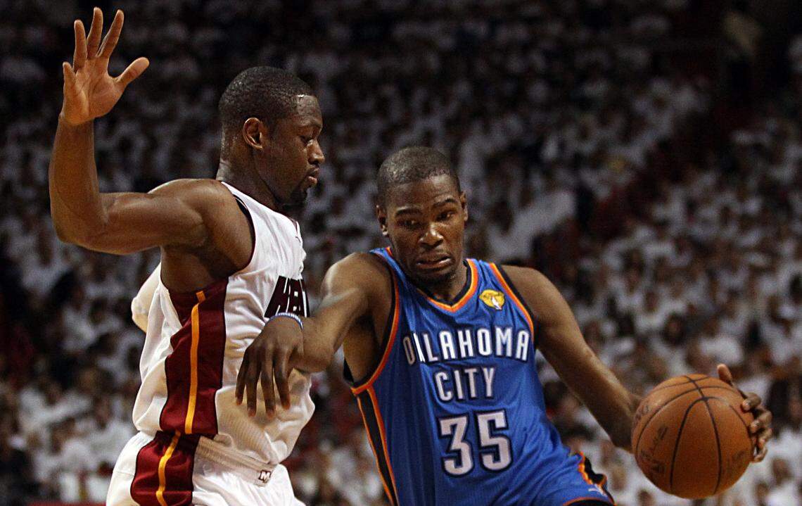 Miami Heat’s Dwyane Wade, defends against Thunder’s Kevin Durant # 35 in the second quarter of game 3 of the NBA finals between the Miami Heat and the Oklahoma City Thunder, at AmericanAirlines Arena in Miami on Sunday, June 17, 2012.