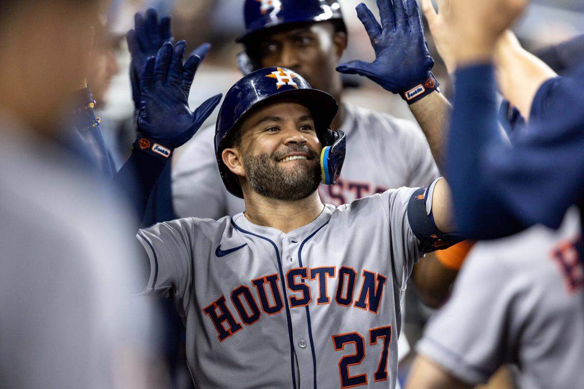 Houston Astros batter Jose Altuve (27) reacts to homering during the first inning of an MLB game against the Miami Marlins at loanDepot park on Tuesday, August 5, 2025, in Miami, Fla.