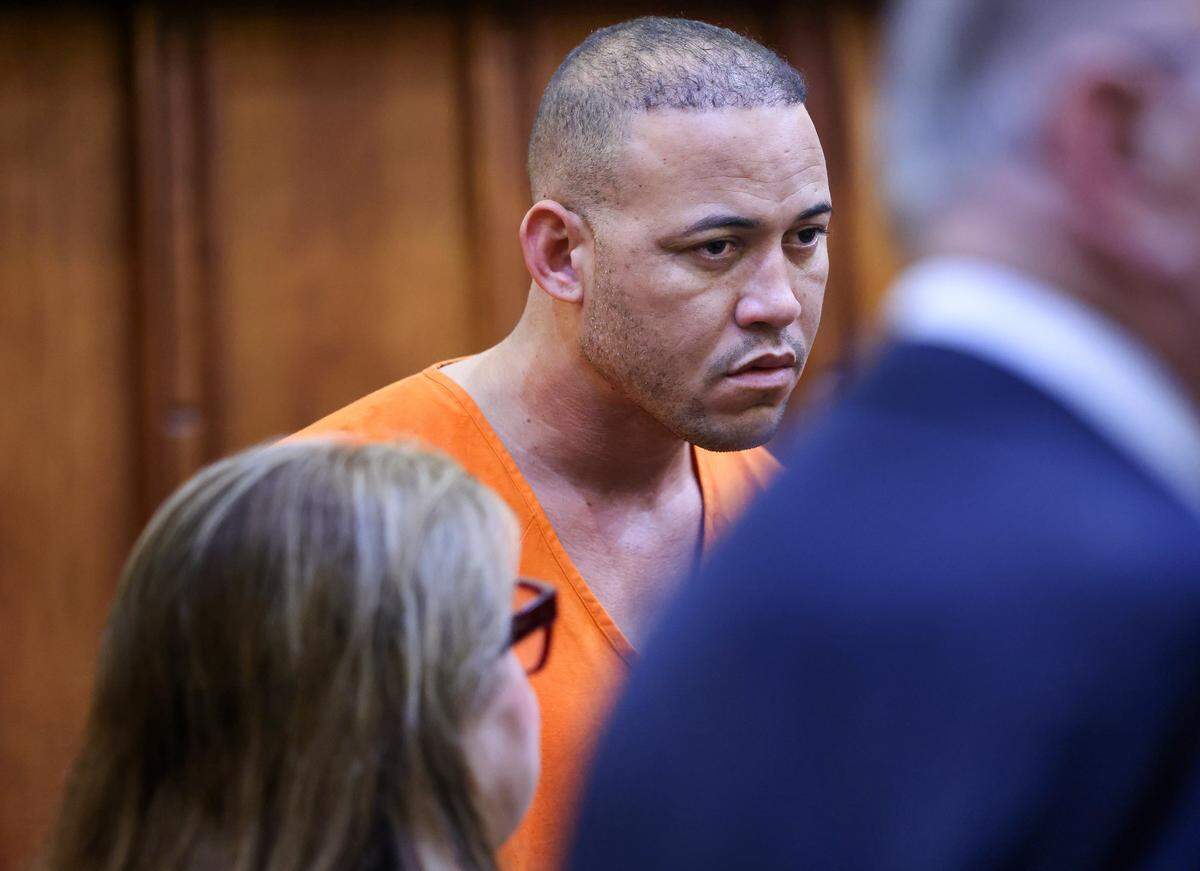 Listening through a translator, Daniel Odio-Suarez, who is accused of shooting and injuring a man and trying to flee to Cuba, appears in court for a pre-trial detention hearing in Courtroom 2-7, with Judge Ariel Rodriguez presiding at Richard E. Gerstein Justice Building on Wednesday, January 14, 2026, in Miami, Florida.