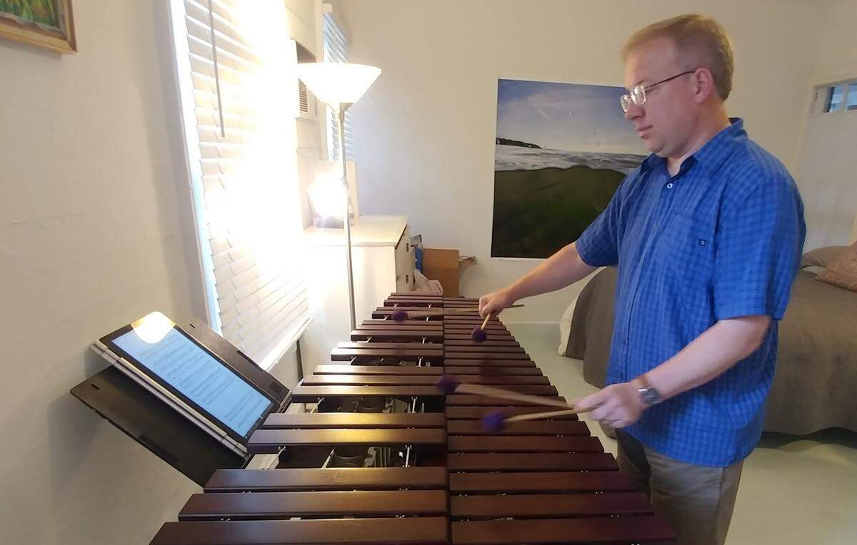 Ben Wahlund performs one of his pieces at a Key West apartment where he is staying as a guest of The Studios of Key West for an artist residency.