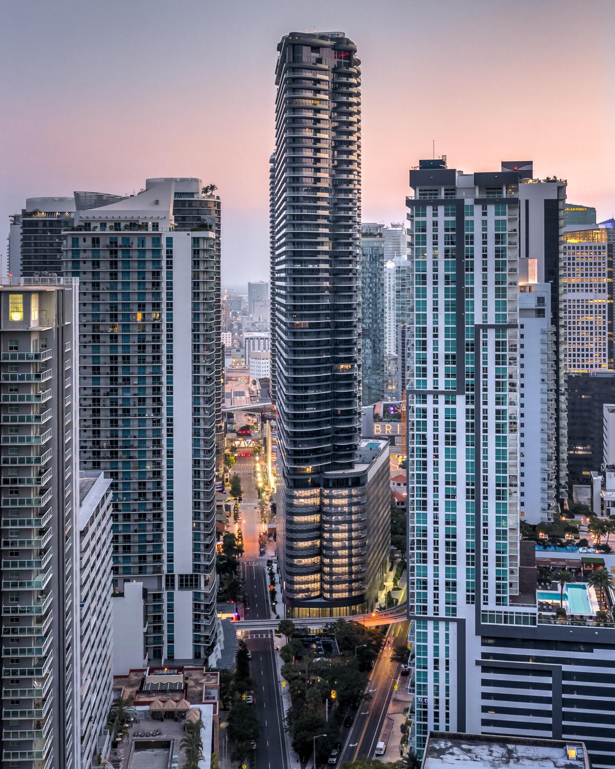 The Brickell Flatiron condo tower, at center, is one of Miami’s 10 tallest buildings, though its precise height is in dispute.