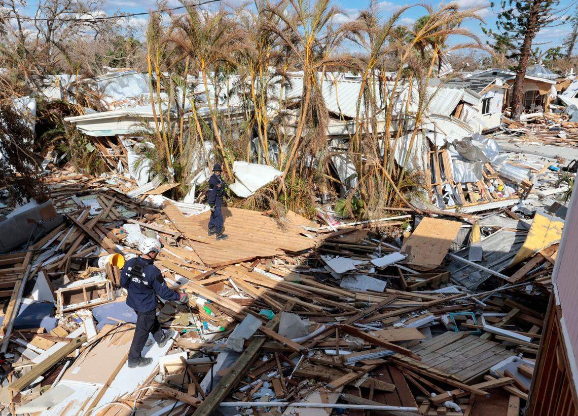 Urban Search and Rescue Florida Task Force 2 search the damaged homes on Fort Myers Beach on Monday, Oct. 3, 2022.