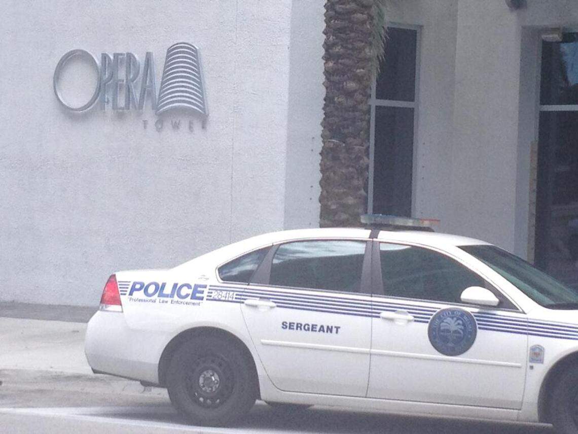 Police investigated a triple-shooting on the 19th floor at the posh Opera Tower in downtown Miami in May 2013.
