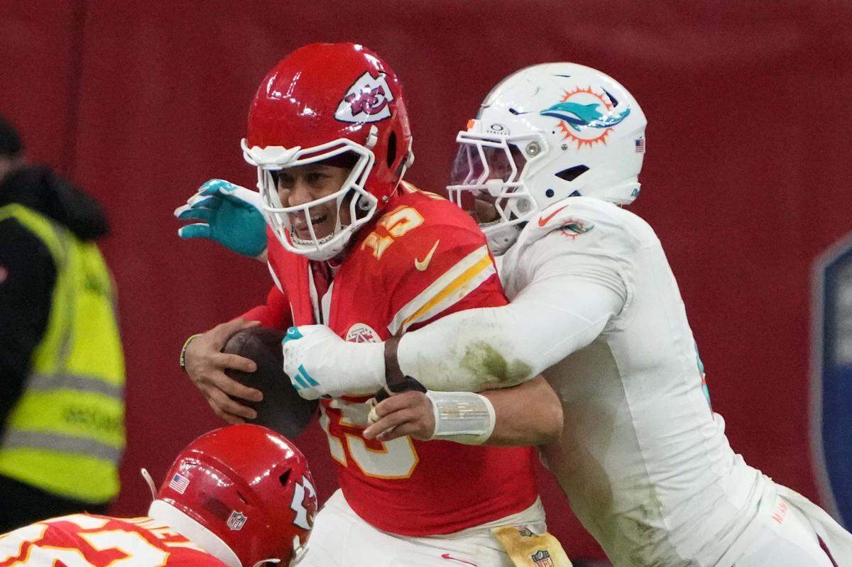 Nov 5, 2023; Frankfurt, Germany; Miami Dolphins linebacker Bradley Chubb (2) forces a fumble by Kansas City Chiefs quarterback Patrick Mahomes (15) in the second half during an NFL International Series game at Deutsche Bank Park. Mandatory Credit: Kirby Lee-USA TODAY Sports