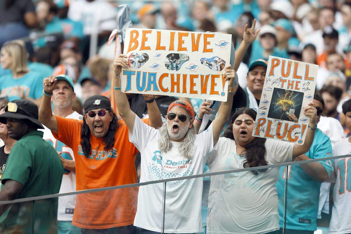 Miami Dolphins fans show their support during the second half of their NFL football game against the Los Angeles Chargers at Hard Rock Stadium in Miami Gardens, FL, on Sunday, October 12, 2025. 