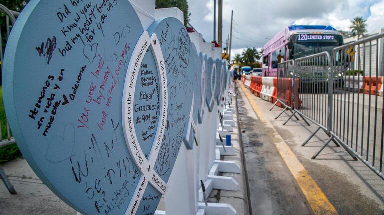 One more victim identified in Surfside collapse. Memorial for lost loved ones growing